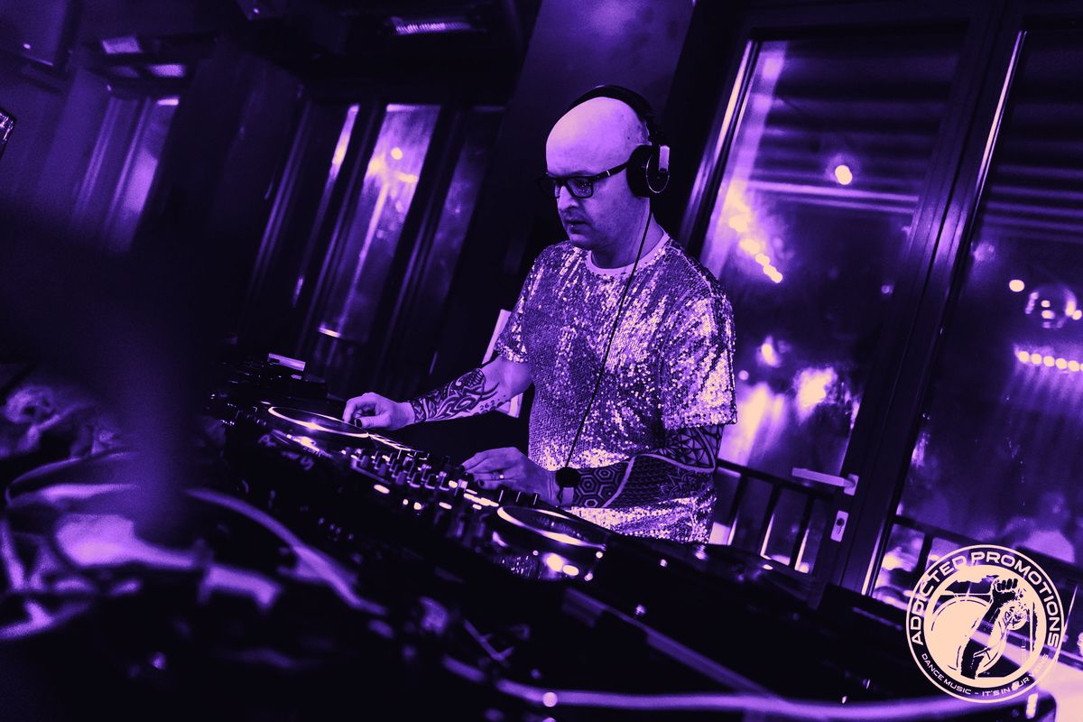 Paul Carson mixing on Pioneer decks at a club night